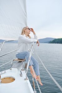 Woman in jeans on boat - captain's tips cure - marinalife